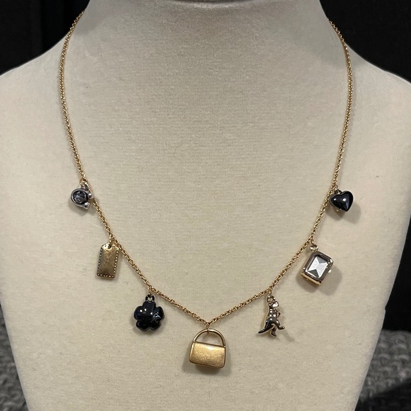 NWT COACH Signature Tabby Charm Necklace with 7 Charms, Gold, 16" + 2" - Picture 1 of 6